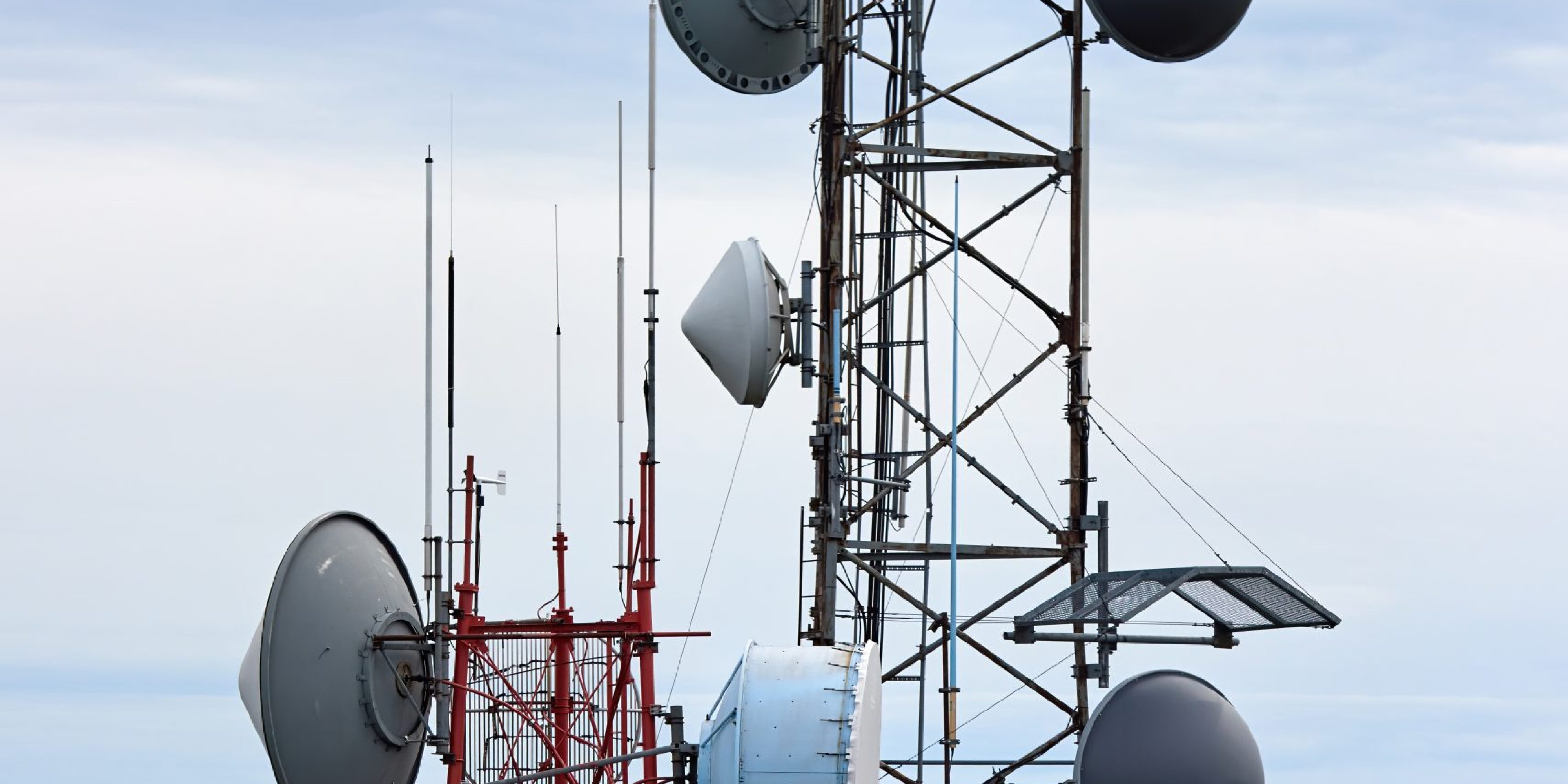 Communication tower at cloudy weather in Massachusetts, USA